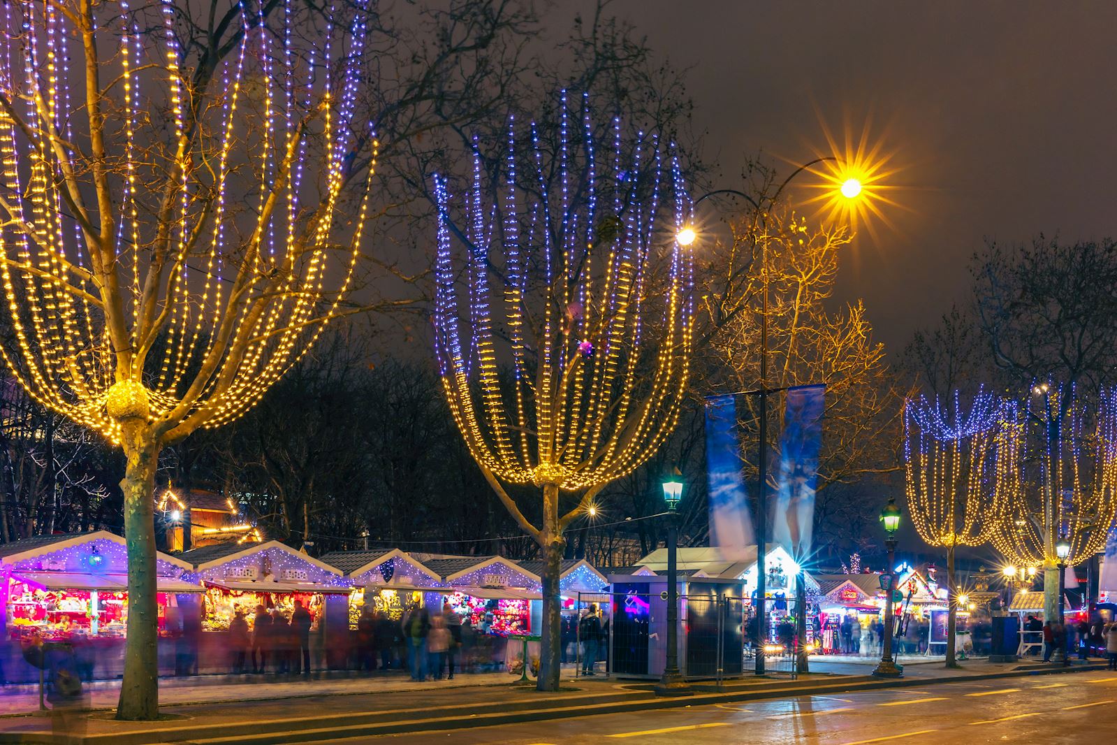 Christmas market on the Champs Elysees in Paris at night