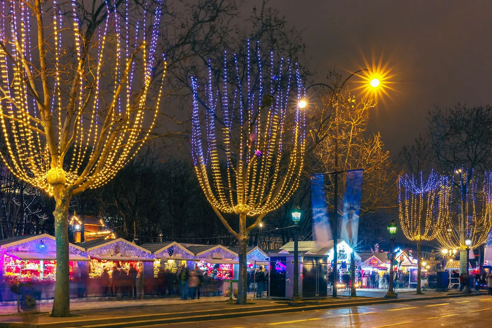 Christmas market on the Champs Elysees in Paris at night